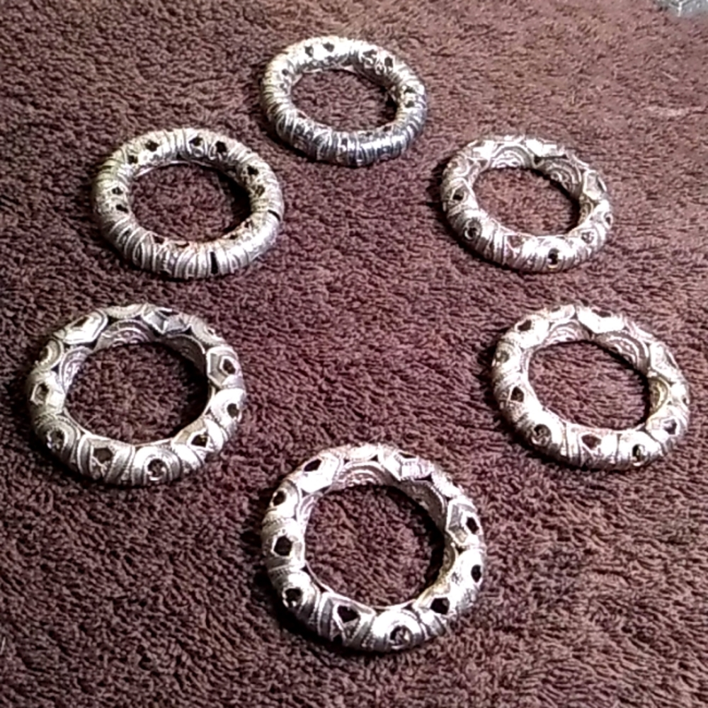 Silvery vintage napkin rings